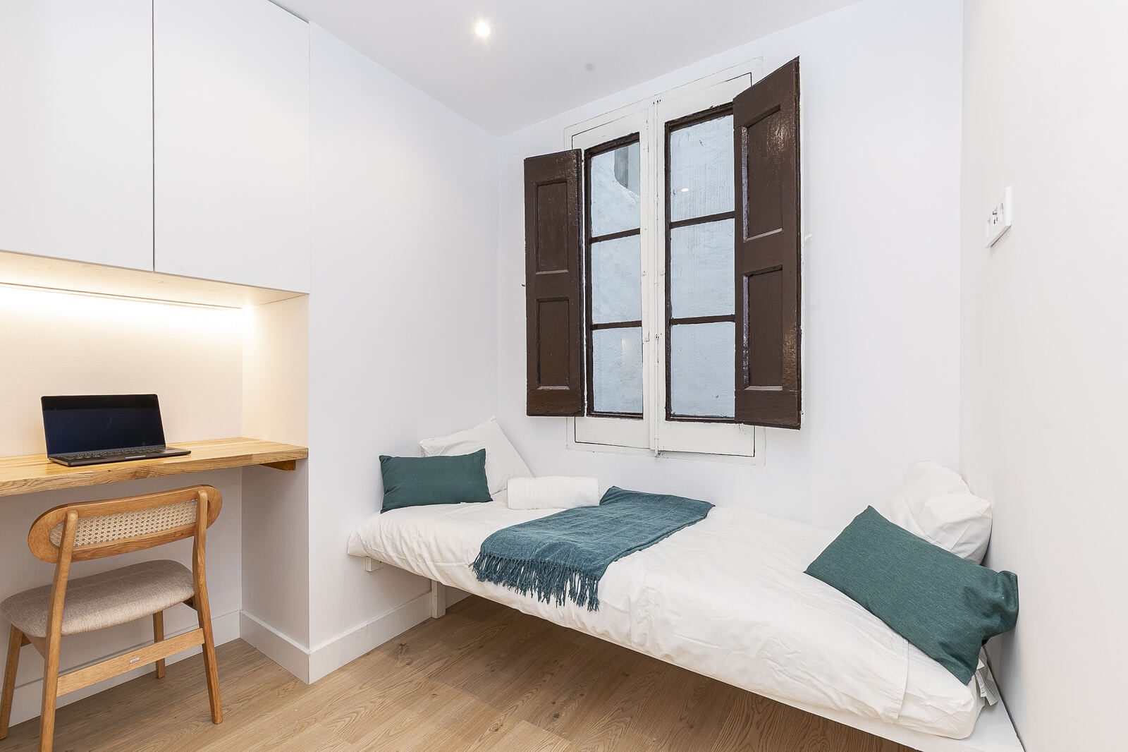 Second bedroom with built-in desk